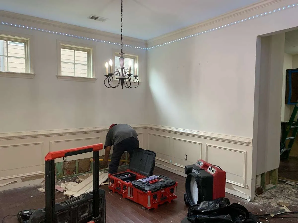 Restoration technician with professional equipment in Saddle Brook